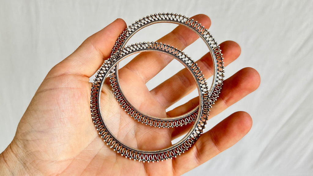 Two Sterling Silver Bangles. India. 1050