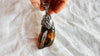 Amber & Sterling Pendant on a Silver Chain. 2876