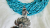 Sacred Heart Turquoise Necklace. Handcrafted Sterling Silver Pendant on a Multi-Strand Necklace.
