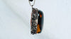 Large Amber and Sterling. Pendant on a Leather Cord