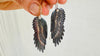 Carved Black Wings Earrings. Exquisitely Crafted Clam Shell and Sterling Silver Jewelry. Atelier Aadya. 2734