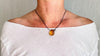 Large Amber Pendant on a Leather Cord. 0605