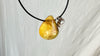 Large Amber Pendant on a Leather Cord. 0605