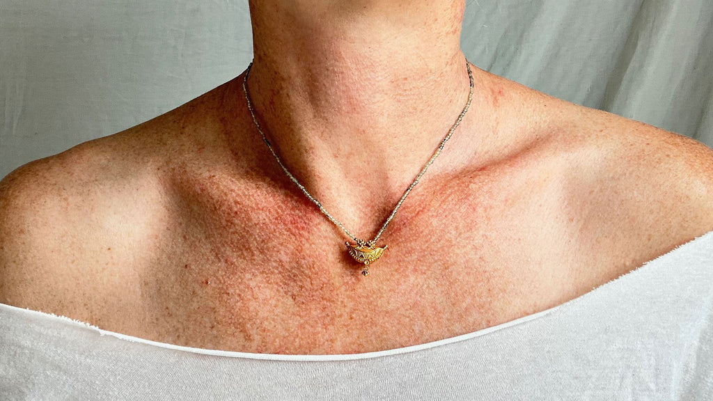 Gold Amulet & Green Sapphire Beaded Necklace. 20kt. 2074