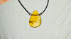 Amber Pendant on a Leather Cord. Handmade Necklace. 1402