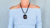 Large Amber and Sterling. Pendant on a Leather Cord