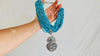 Sacred Heart Turquoise Necklace. Handcrafted Sterling Silver Pendant on a Multi-Strand Necklace.