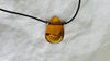 Amber Pendant on a Leather Cord. Handmade Necklace. 1402