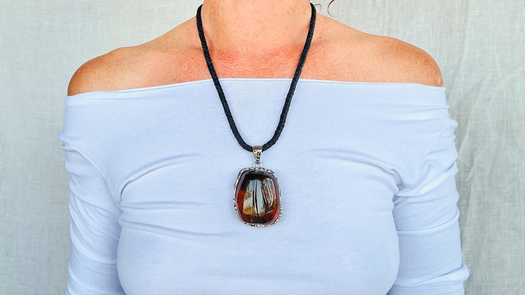 Large Amber and Sterling. Pendant on a Leather Cord