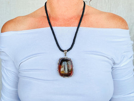 Large Amber and Sterling. Pendant on a Leather Cord