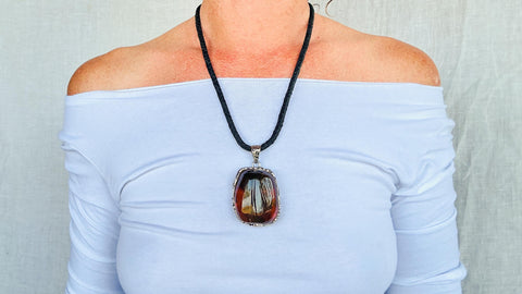 Large Amber and Sterling. Pendant on a Leather Cord