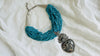Sacred Heart Turquoise Necklace. Handcrafted Sterling Silver Pendant on a Multi-Strand Necklace.