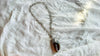 Amber & Sterling Pendant on a Silver Chain. 2876