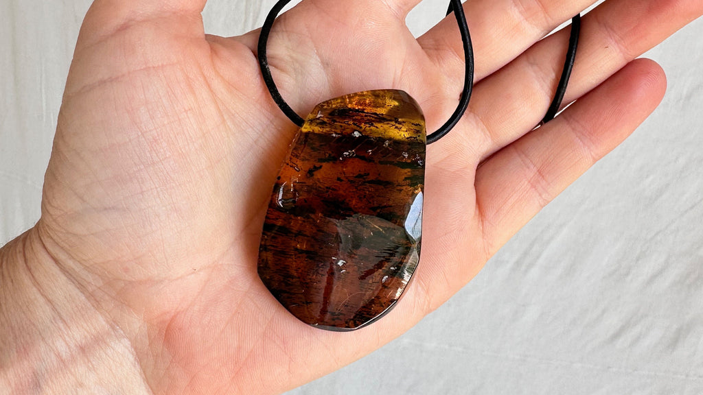 Large Amber Pendant on a Leather Cord. 1173