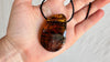 Large Amber Pendant on a Leather Cord. 1173