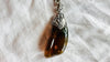 Amber & Sterling Pendant on a Silver Chain. 2876