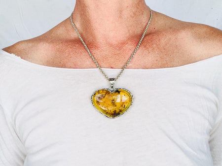 Amber & Sterling Heart Pendant on a Silver Chain. 4448