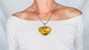 Amber & Sterling Heart Pendant on a Silver Chain. 4448