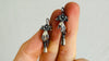 Sterling Silver Earrings. Cast Hand and Monte Alban Bells. 2587