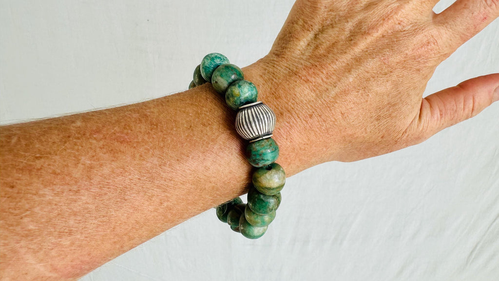Guatemalita Jade Beaded Bracelet with a Sterling Silver Bead.