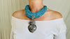 Sacred Heart Turquoise Necklace. Handcrafted Sterling Silver Pendant on a Multi-Strand Necklace.