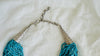 Sacred Heart Turquoise Necklace. Handcrafted Sterling Silver Pendant on a Multi-Strand Necklace.