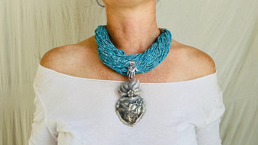 Sacred Heart Turquoise Necklace. Handcrafted Sterling Silver Pendant on a Multi-Strand Necklace.