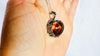 Amber & Sterling Heart Pendant on a Silver Chain. AP-354