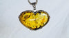 Amber & Sterling Heart Pendant on a Silver Chain. 4448