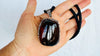 Large Amber and Sterling. Pendant on a Leather Cord