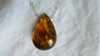 Large Amber Pendant on a Silver Chain. 2558