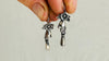 Sterling Silver Earrings. Cast Hand and Monte Alban Bells. 2587