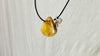 Large Amber Pendant on a Leather Cord. 0605