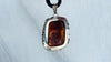 Large Amber and Sterling. Pendant on a Leather Cord