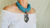 Sacred Heart Turquoise Necklace. Handcrafted Sterling Silver Pendant on a Multi-Strand Necklace.