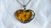 Amber & Sterling Heart Pendant on a Silver Chain. 4448