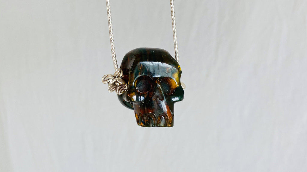 Amber Skull Pendant on Sterling Silver Snake Chain.