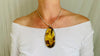 Large Amber Pendant on a Silver Cord. Snake Chain.
