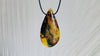 Large Amber Pendant on a Leather Cord
