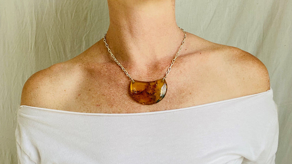 Amber Pendant on a Silver Chain.