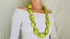Long Serpentine Necklace. Yellow  Green. Large Spherical Beads.