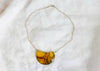 Amber Pendant on a Silver Chain.