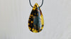 Large Amber Pendant on a Leather Cord
