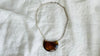 Amber Pendant on a Silver Chain. 0148