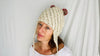 Wool Pompom Hat with Ear Flaps.
