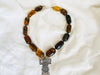 Monte Alban Pendant on Amber Necklace. Sterling Silver. Mexico.
