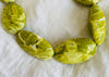 Long Serpentine Necklace. Yellow  Green. Large Spherical Beads.