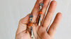 Coral and Sterling Silver Earrings. Cast Hand and Monte Alban Bells. - Aadya Bazaar