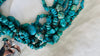Turquoise and Silver Multi-Strand Necklace.